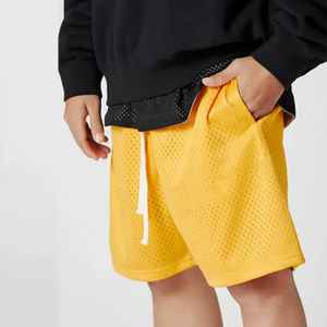 Shorts de basketball pour hommes en toile unie, style streetwear, avec cordon de serrage, tendance, séchage rapide, respirant, taille élastique, vente en gros - Product Image 1
