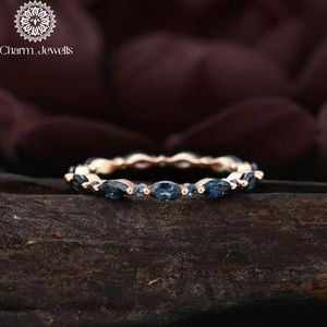 Charm_Jewells Rose Gold Eternity <b>Band</b> <b>Ring</b> with Cushion Cut Blue Moissanite Prong Setting Women's Classic Engagement <b>Ring</b> - Product Image 1