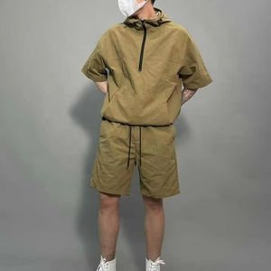 Custom High Quality Casual Reflective Stripe Embroidery Design Loose Mesh Lining Gym Short Nylon Windbreaker Short for Men - Product Image 1