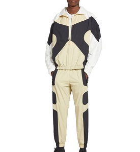 Conjunto de chándal cortavientos ligero para hombre al por mayor 2025 chaqueta de poliéster 100% personalizable fabricante de chándal completo fino - Product Image 1