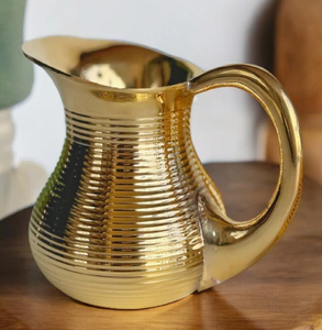 Royal brass jug with intricate embossed patterns, a pedestal base, and ornate <b>handle</b>. Royal look available at wholesale price. - Product Image 3