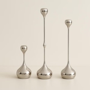 Ensemble de porte-bougies en acier inoxydable, design moderne et minimaliste, décoration d'intérieur, finition métallique durable, trois tailles incluses - Product Image 1