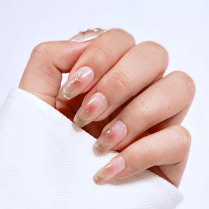 Uñas Postizas Personalizadas con Brillo Nude, Uñas Artificiales al por Mayor, Diseño Degradado Champán con Estrellas, Forma Almendrada, OEM ODM Helios - Product Image 1