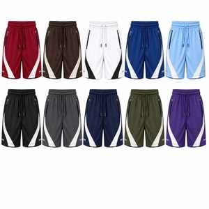 Shorts de sport blancs pour hommes avec empiècements latéraux noirs, taille à cordon de serrage, séchage rapide, poches zippées - Product Image 5
