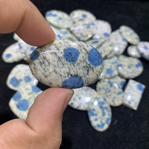 พลอยหลวมธรรมชาติที่ได้รับการรับรองจาก Rida K2จุดสีขาวและน้ำเงิน - Product Image 1