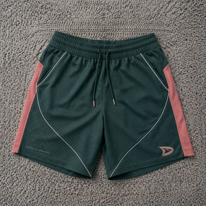 Shorts de Pickleball Cortos de la Marca Boutique, Color Verde Jade Oscuro, Ropa Deportiva de Lujo con Paneles Curvos de Diseño Exclusivo - Product Image 1