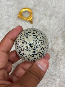 Dalmatian jasper <b>sphere</b> featuring creamy stone tones playful dark speckles rounded shaping smooth polish and distinctive - Product Image 3