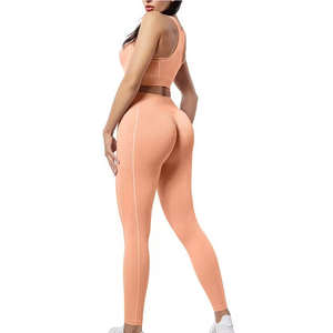 Conjunto deportivo de 2 piezas para mujer, leggings de yoga acanalados sin costuras, ropa deportiva de alta calidad para entrenamiento en el gimnasio. - Product Image 2