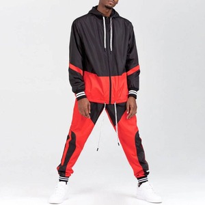 Ensemble de survêtement sportif pour homme avec veste zippée et pantalon personnalisés, en polyester et nylon coupe-vent - Product Image 6