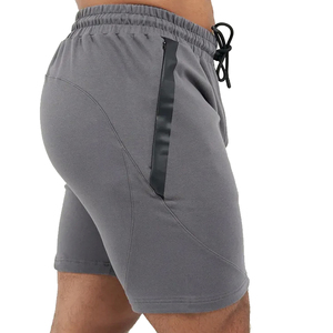 Shorts de sport gris uni en polyester pour homme, taille mi-haute avec cordon de serrage, séchage rapide, rayures latérales, style décontracté - Product Image 2