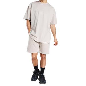 Conjunto de 2 Piezas de Verano para Hombre, Estilo Casual Urbano, Pantalones Cortos con Cintura Elástica y Camiseta Transpirable de Punto, Alta Calidad OEM - Product Image 1