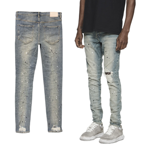กางเกงยีนส์ผู้ชายสไตล์สตรีทแฟชั่น เอวสูง ทรงฮิปฮอป กระชับรูปทรง สีพื้น ล้างสี ทำสี และขาดๆ แต่งลายพ่นสี ผ้ายีนส์ยืด - Product Image 1