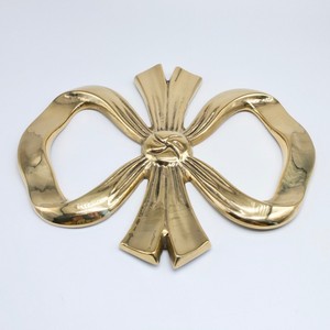 New Arrival Golden Oriental Bow <b>Trivet</b> Custom Shape Table Decoration Metal Accent Piece - Product Image 1