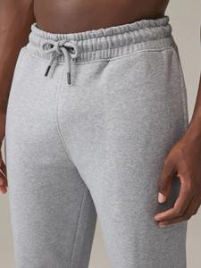 กางเกงวอร์มขายส่ง OEM ทรงตรงขนาดใหญ่พิเศษ สไตล์ลำลอง ผ้าขนสัตว์ สำหรับฤดูหนาว ออกแบบและปรับขนาดได้ตามต้องการ กางเกงวอร์มผู้ชาย แบรนด์ส่วนตัว - Product Image 2