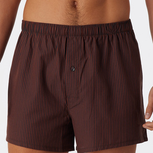 Calzoncillos bóxer sin costuras de cintura media para hombre, de tela de punto transpirable, de secado rápido, con logo digital impreso en la cintura y patrón liso. - Product Image 2