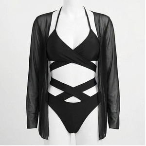 Maillot de bain une pièce noir pour femme avec col halter croisé et découpes, taille haute, avec paréo transparent - Product Image 1
