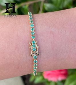 Luxury 18K Gold Emerald Tennis <b>Bracelet</b>, Featuring Round Cut Stones with Emerald-Cut Center Stone, Fine Jewelry Gift for Women - Product Image 2