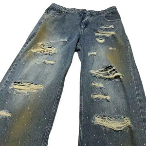 Faites sensation à chaque fête avec notre collection scintillante de jeans en denim délavé, ornés de strass, tendance et élégants. - Product Image 2