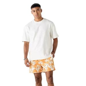Shorts de bain pour hommes avec logo personnalisé, imprimé uni, style streetwear, séchage rapide, respirant, anti-UV, tissu polyester écologique - Product Image 1