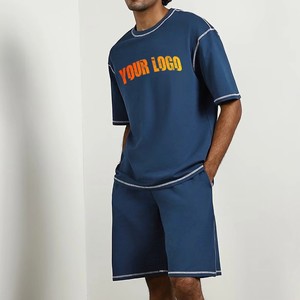 Ensemble T-shirt et short en polyester bleu grande taille pour homme, col en V, décontracté, respirant, imprimé avec logo lettre sur le devant, personnalisable OEM - Product Image 1