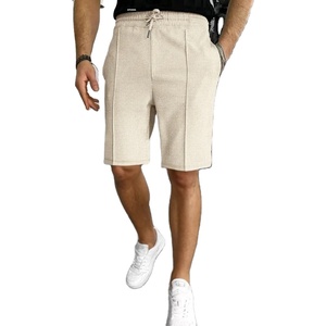 Nouveaux shorts décontractés pour hommes en tissu gaufré uni avec cordon de serrage, polyvalents, pour l'extérieur, style urbain, anti-froissement, séchage rapide, élastiques - Product Image 5