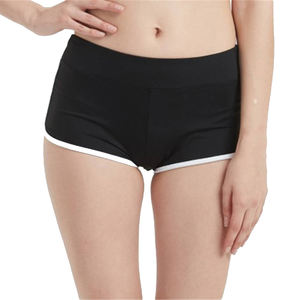 Shorts de yoga taille haute pour femme, motif uni, en Spandex/Nylon, avec poche inférieure, taille élastique, amincissant, pour le fitness - Product Image 1