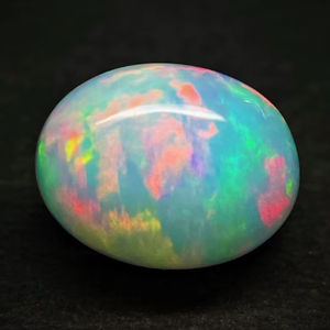 Gema de ópalo etíope suelta de 7x5 mm - Gemas de ópalo Welo de forma ovalada multicolor - Piedra de ópalo lisa para joyería - Product Image 1