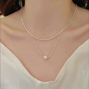 สร้อยคอมุกน้ำจืดสองชั้นสำหรับผู้หญิง ดีไซน์ทันสมัยแบบเน็ตไอดอล สร้อยคอระยิบระยับสุดเท่ ระดับไฮเอนด์ - Product Image 1