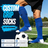 Chaussettes de football personnalisées à forte valeur ajoutée Chaussettes à prise en main d'usine Chaussettes antidérapantes