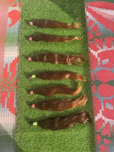 ผมต่อแบบรีมี่อินเดียสีน้ำตาลธรรมชาติ แบบไม่ผ่านการยืด  แบบเส้นผมธรรมชาติ  ขายเป็นมัด - Product Image 3