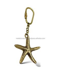 Porte-clés Étoile de Mer Métallique Dorée – Breloque Décorative pour Sac et Cadeau - Product Image 1
