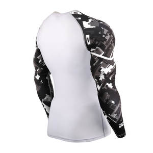 Camisetas de compresión para gimnasio para hombre con tela flexible, estructura que se adapta al cuerpo y costuras duraderas para entrenamientos intensos - Product Image 2