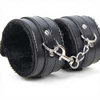 Menottes en cuir noir BDSM pour bondage avec alliage métallique RARISSIME INC RARLEATHER