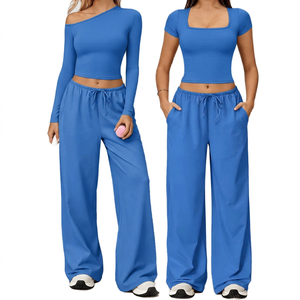 Ensemble de fitness deux pièces respirant et écologique pour femme, legging de yoga et de pilates côtelé sans couture en spandex/nylon, le plus vendu - Product Image 1