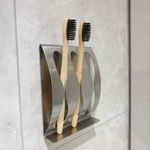 Portacepillos de dientes de bambú de acero inoxidable para montar en la pared con organizador de accesorios de baño de diseño moderno - Product Image 1