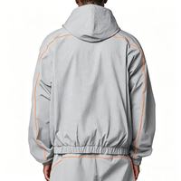 Ensemble survêtement coupe-vent pour homme, noir, avec bordures contrastées, veste à capuche légère en nylon et pantalon, haute qualité