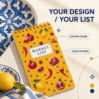Bloc-notes spirale personnalisé LABON avec couverture jaune, motif grenades, citrons, piments, anis étoilé, étiquette bleue