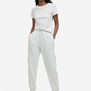 Pantalon de survêtement bleu foncé ample en tissu jersey doux 65% coton 35% polyester avec poignets côtelés - Product Image 1