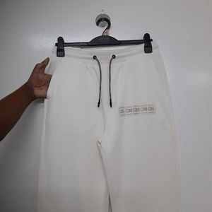 Pantalon de jogging pour homme en molleton 100% coton, essentiel au quotidien, léger et respirant, idéal pour les voyages et les loisirs - Product Image 1