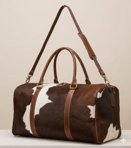 กระเป๋าเดินทางหนังวัวแท้สไตล์ผู้บริหาร พร้อมซิปปิด ดีไซน์ทันสมัย ใช้ได้ทั้งชายและหญิง รุ่น LHDB-0161 - Product Image 1