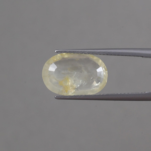 พลอยแซฟไฟร์สีเหลืองทรงรีขนาด 15x10 มม. น้ำหนัก 6.63 กะรัต รับรองโดย IGI แท้ 100%  ผ่านการเคลือบแว็กซ์/น้ำมัน เปลี่ยนสีได้ คุณภาพพรีเมียม - Product Image 3