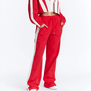 Pantalon de survêtement unisexe léger en tissu coupe-vent avec empiècements contrastants rouges, style streetwear, fournisseur en gros, pantalon pour homme - Product Image 1