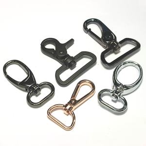 Gancho giratorio de Metal para perros, accesorios para bolso de mano - Product Image 1