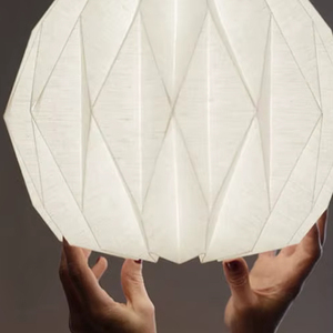 Elegante Portavelas de Ratán con Diseño Tejido a Mano, Textura Natural, Iluminación Cálida Ambiental, Decoración para el Hogar - Product Image 1