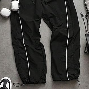 Pantalon de survêtement coupe ample et légère pour homme OEM, en nylon, avec taille élastique et cordon de serrage, idéal pour l'entraînement - Product Image 4