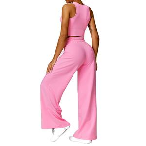 Ensemble de yoga deux pièces : Crop top sans manches dos nageur et pantalon taille haute à jambes larges, couleur unie, respirant, taille élastique torsadée - Product Image 2