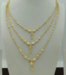 Exquisite 22K Gold <b>Triple</b> Layered <b>Necklace</b> for Women Featuring Intricate Textured Gold Beads and Elegant Tiered Design - Product Image 1