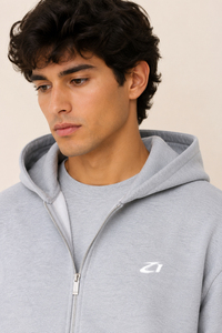 Sweat à capuche zippé pour homme en molleton de coton gris chiné, avec logo frontal, épaules tombantes et poche kangourou, style streetwear décontracté pour l'hiver - Product Image 2