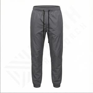 Pantalones impermeables de nailon con estampado de logotipo personalizado Popular de primavera, pantalones para correr de gran tamaño para hombre, pantalones cortavientos para correr con forro de malla - Product Image 2