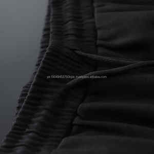 Pantalones casuales para hombre Pantalones de alta calidad 100% Poliéster Patrón sólido con decoración de botones Ropa de gimnasio personalizable a precio - Product Image 4